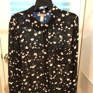 Sheer black button front blouse,white heart print.